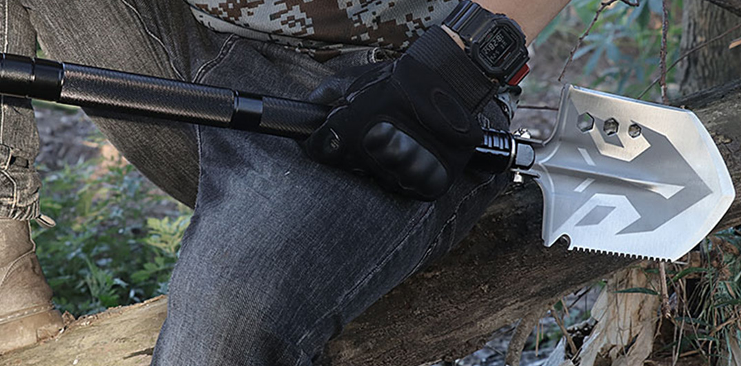 military style trenching tool with compass