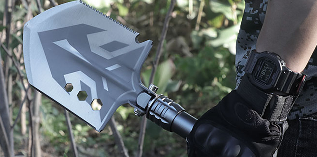 Ergonomic D-grip survival shovel